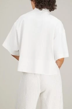Cropped Oversized Polo In White 7 Cropped Oversized Polo In White -Dries Van Noten Shop rosettagetty CroppedOversizedPoloinWhite 3